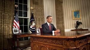 El presidente Obama sentado